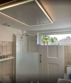 Infraroodpaneel met LED in de badkamer Infraroodpaneel met LED in de badkamer